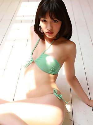 Anna Konno Asian in green bath suit and heels is sexy and playful
